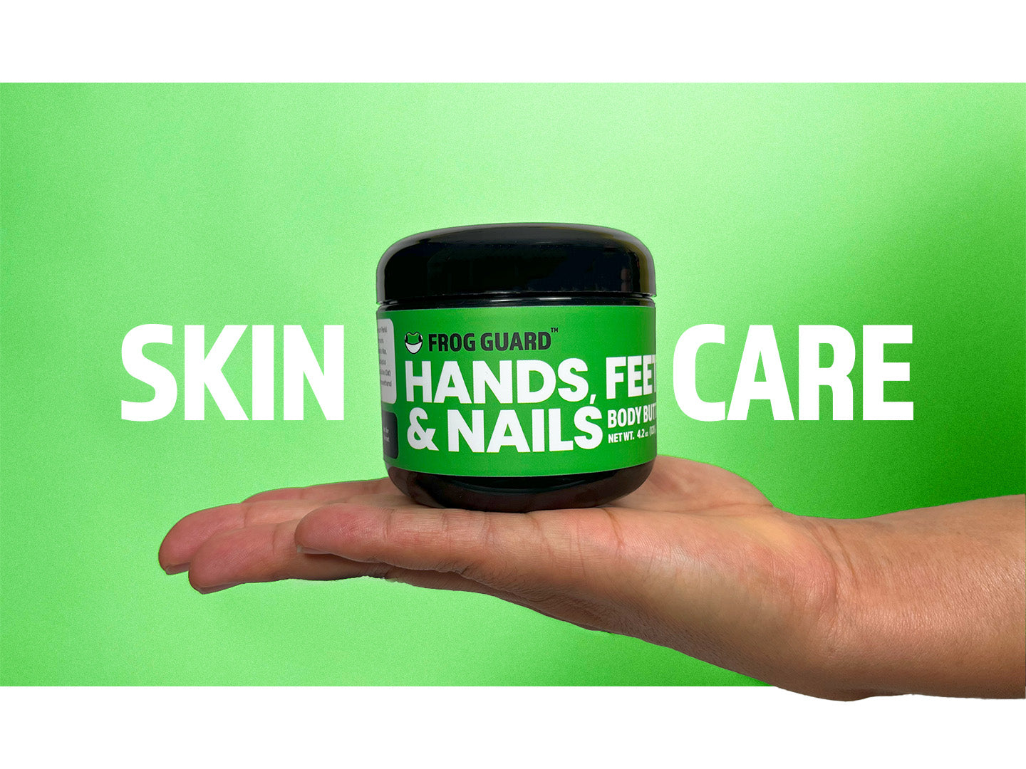 Hand holding Frog Guard 'Hands Feet & Nails' product against a green background with the words "Skin Care" on the sides.